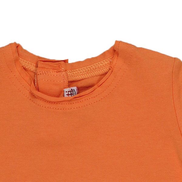 Confetti by Absorba. Orange baby bluse med rå kanter, udsnit