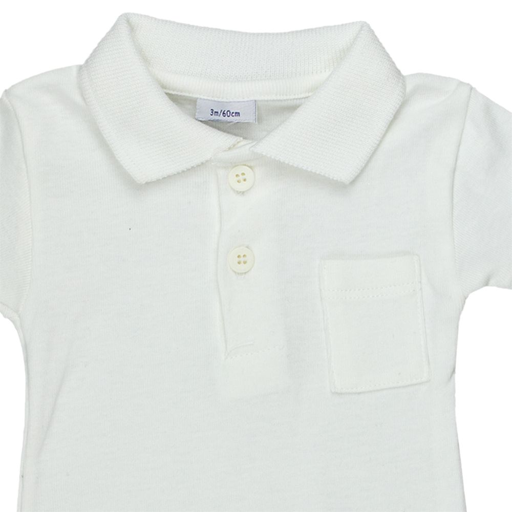Petit Bateau. Kortærmet hvid body med polokrave, udsnit