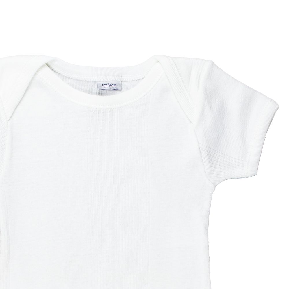 Petit Bateau. Kortærmet hvid body i let rib, udsnit